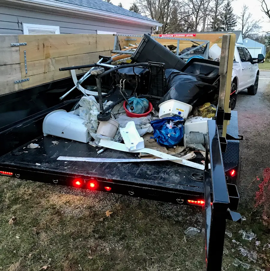 Roll-off dumpster delivered to a residential driveway in Great Falls